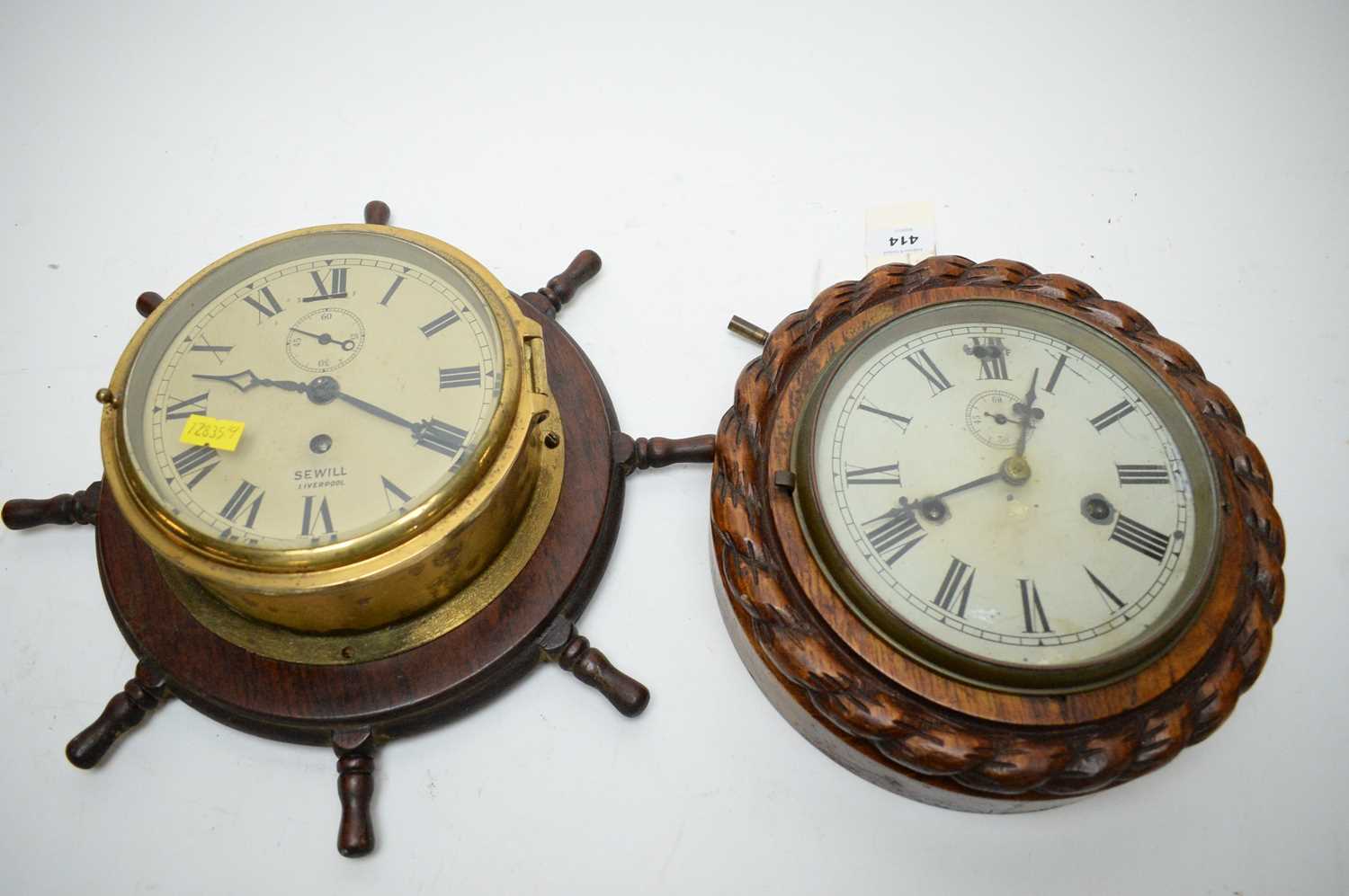 Lot 414 - A Sewill Liverpool brass cased ships clock and another.