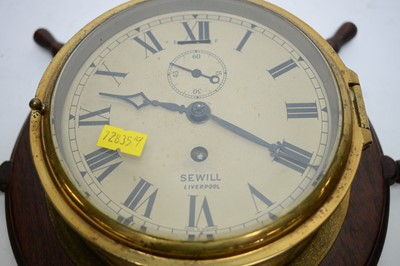 Lot 414 - A Sewill Liverpool brass cased ships clock and another.