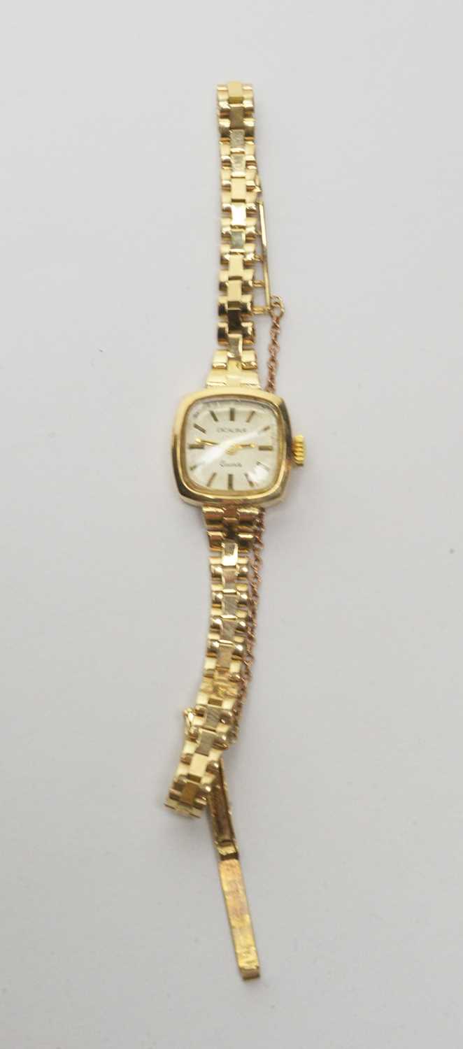 Lot 194 - A gold cocktail watch by Excaliber.