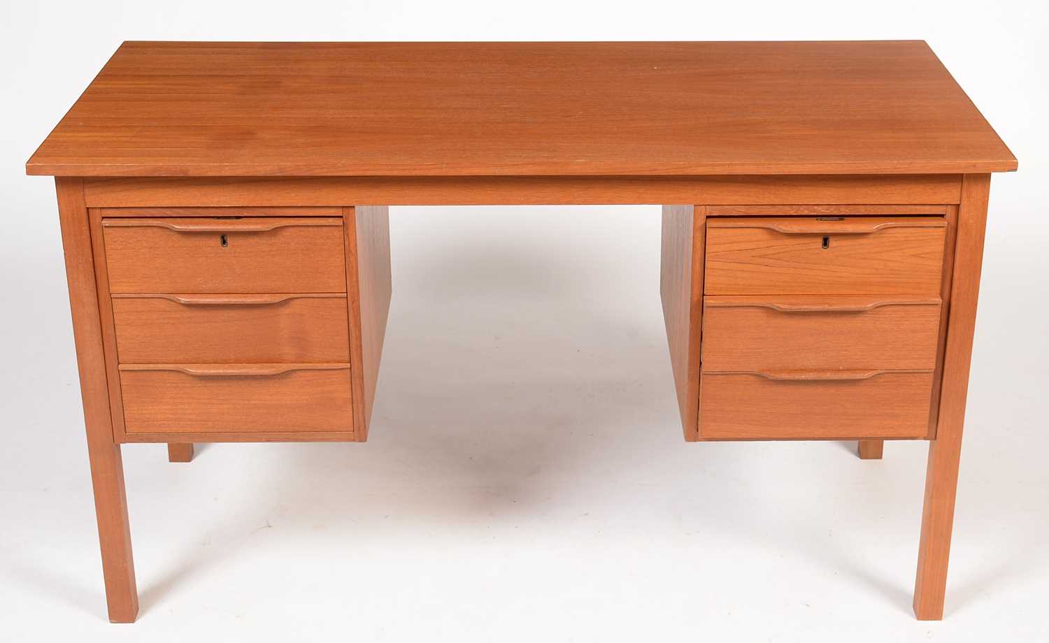 Lot 799 - Bent Silberg, Mòbler: A Danish teak desk fitted six drawers