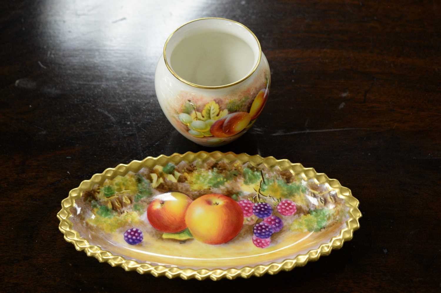 Lot 456 - A Royal Worcester hand-painted dish and a vase.