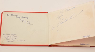Lot 1344 - A collection of autographs including the Beatles and Roger Moore