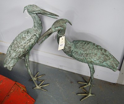 Lot 477 - A pair of cast metal figures of herons.
