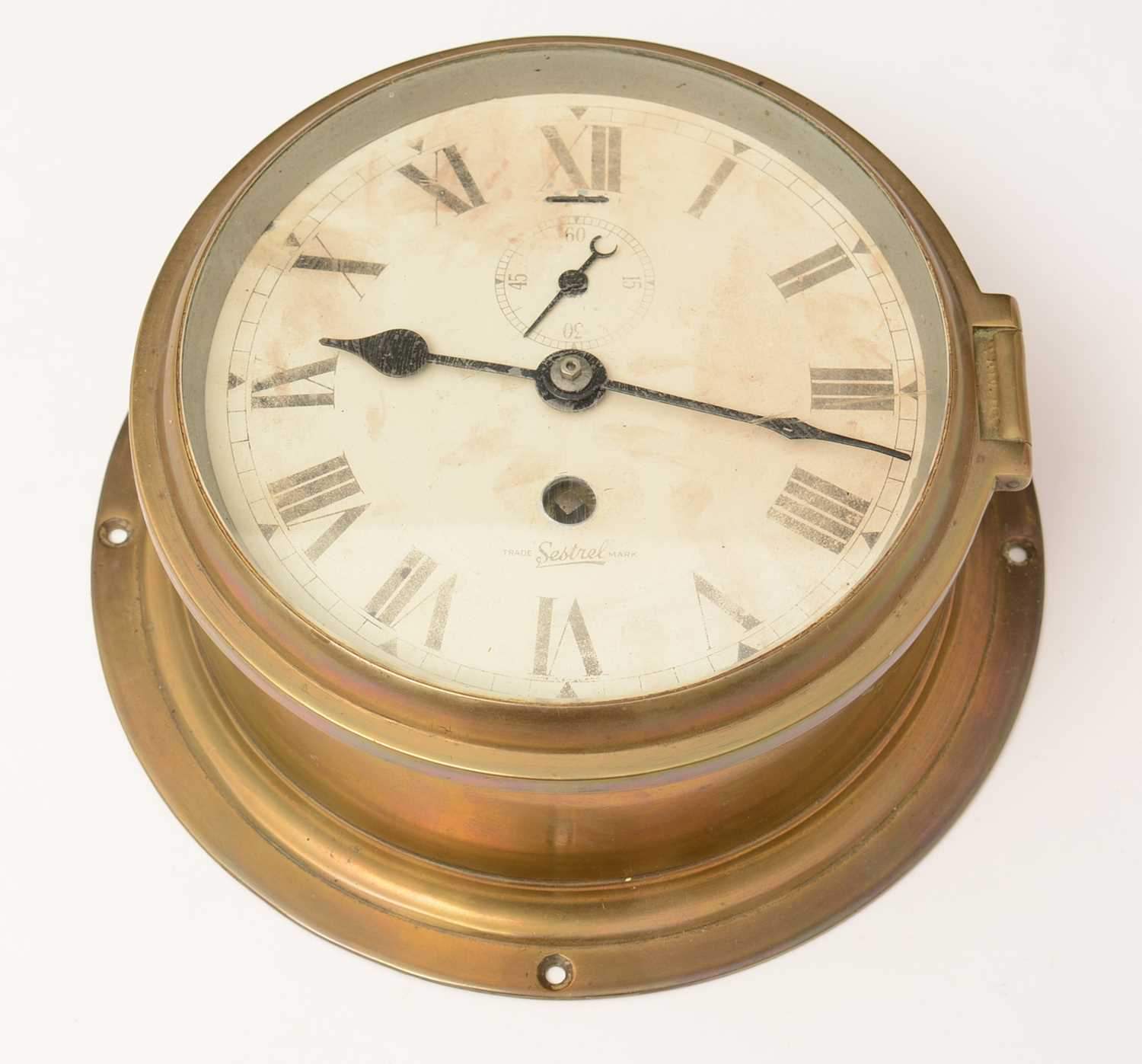 Lot 1201 - A Sestral brass cased ships clock