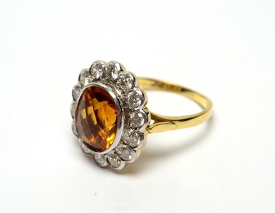 Lot 59 - Citrine and diamond cluster ring