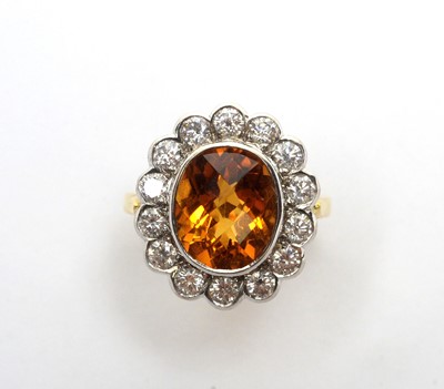 Lot 59 - Citrine and diamond cluster ring