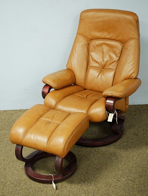 Lot 18 - Mid Century Himolla reclining armchair; and matching footstool.