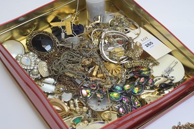 Lot 265 - A tin of costume jewellery