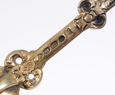 Lot 153 - A Victorian silver-gilt sifting spoon.