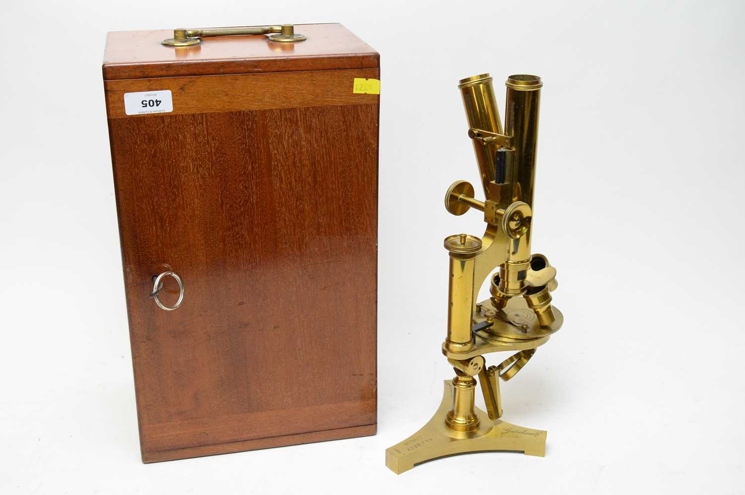 Lot 405 - A cased brass microscope by R&J Beck