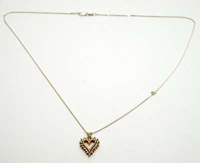 Lot 196 - A diamond heart-shaped pendant