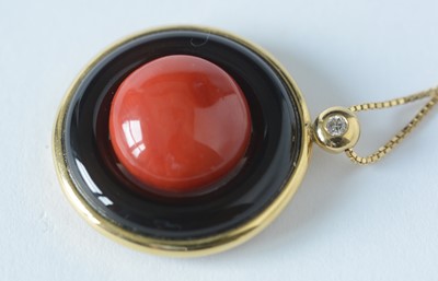Lot 64 - A coral and onyx pendant