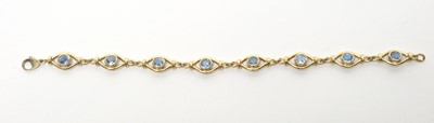 Lot 65 - A sapphire set 9ct yellow gold bracelet