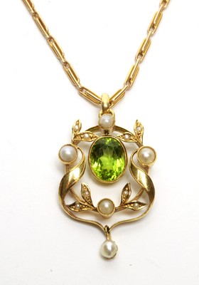 Lot 70 - An Edwardian peridot and seed pearl pendant on chain