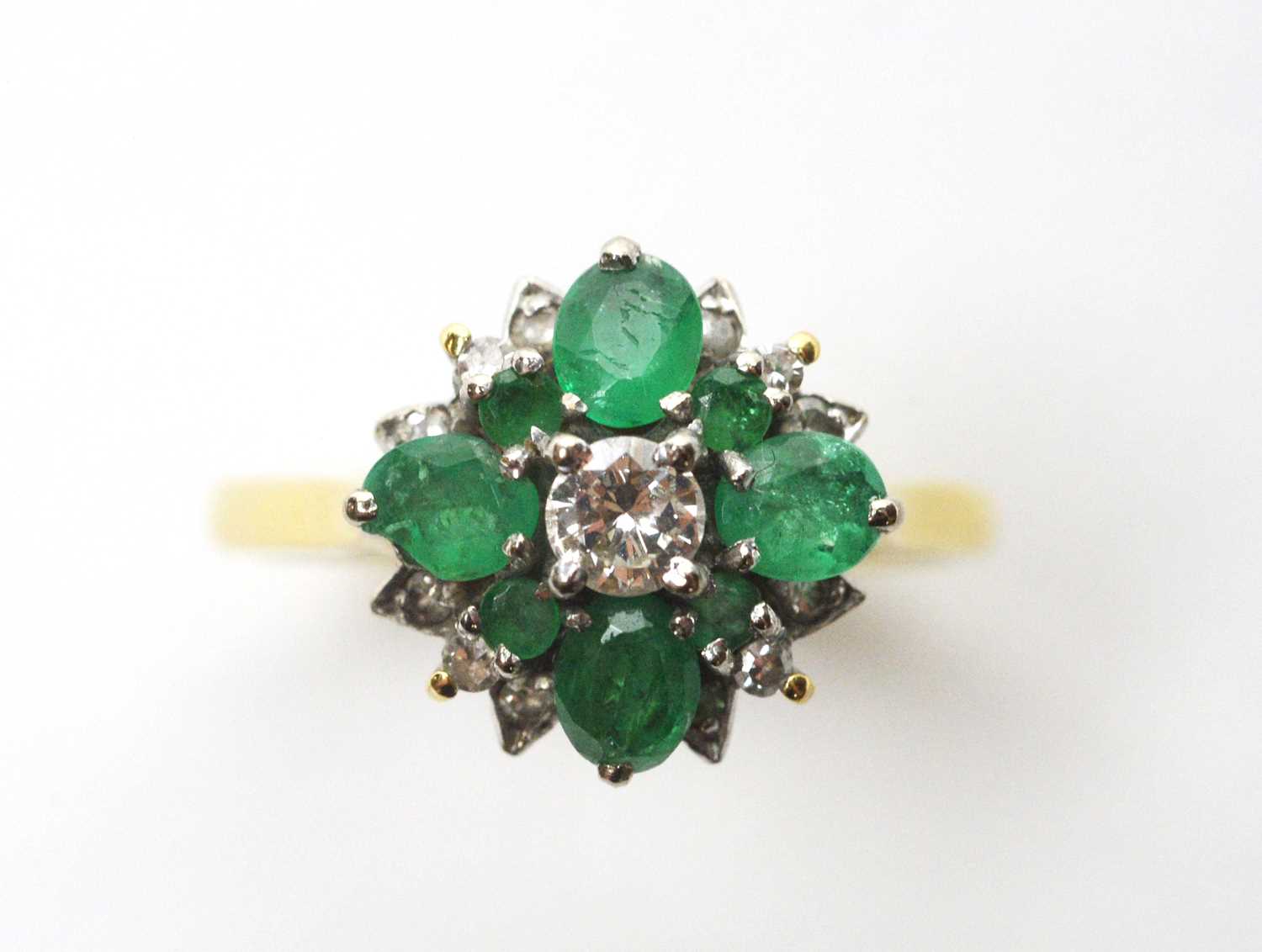 Lot 151 - An emerald and diamond ring