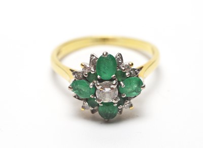 Lot 151 - An emerald and diamond ring
