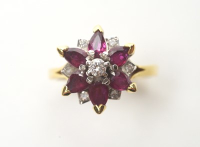 Lot 73 - A ruby and diamond ring