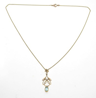 Lot 80 - An Edwardian aquamarine and pearl pendant
