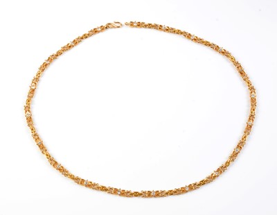 Lot 87 - A diamond set yellow metal necklace