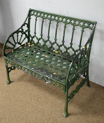 Lot 15 - Late 19th/early 20th C green painted cast iron garden bench.