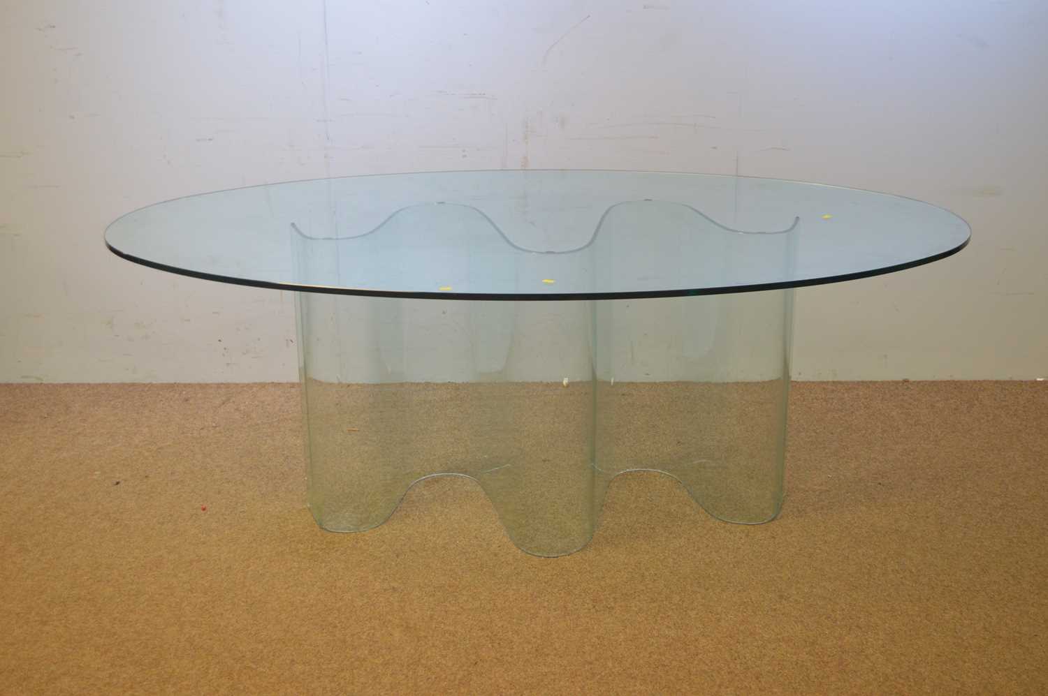 Lot 52 - 20th C glass oval glass dining table.