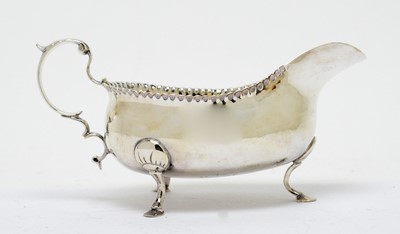 Lot 150 - A George III silver sauce boat, by David Crawford
