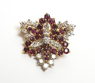 Lot 13 - A ruby and diamond tri-form leaf brooch/pendant