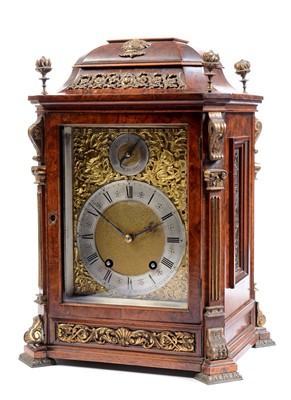 Lot 558 - A 19th Century burr rosewood bracket clock.