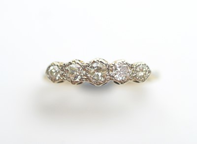 Lot 100 - A five stone diamond ring