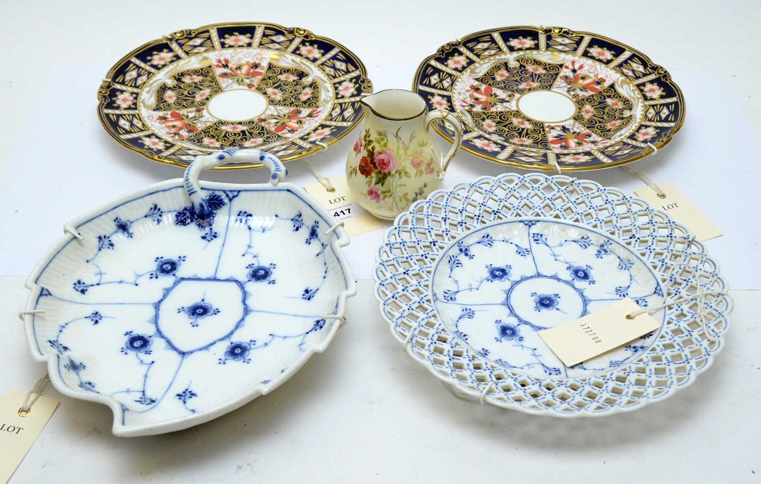 Lot 417 - Two Royal Crown Derby plates; along with two other plates and a Royal Worcester Jug