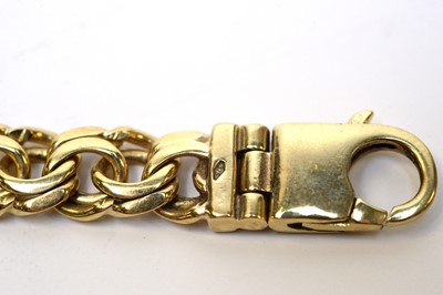Lot 30 - A 9ct gold double curb-link bracelet.