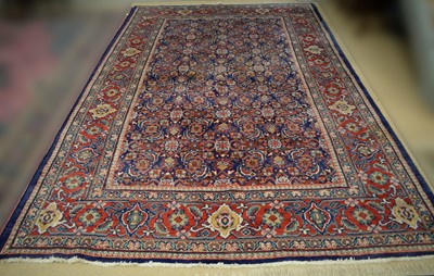 Lot 97 - A Tabriz carpet.