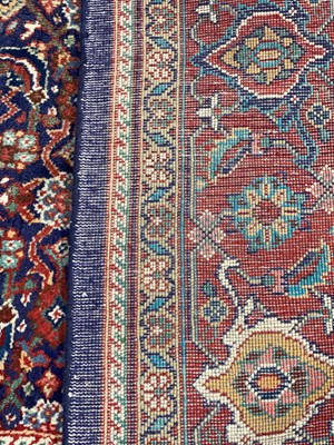 Lot 97 - A Tabriz carpet.