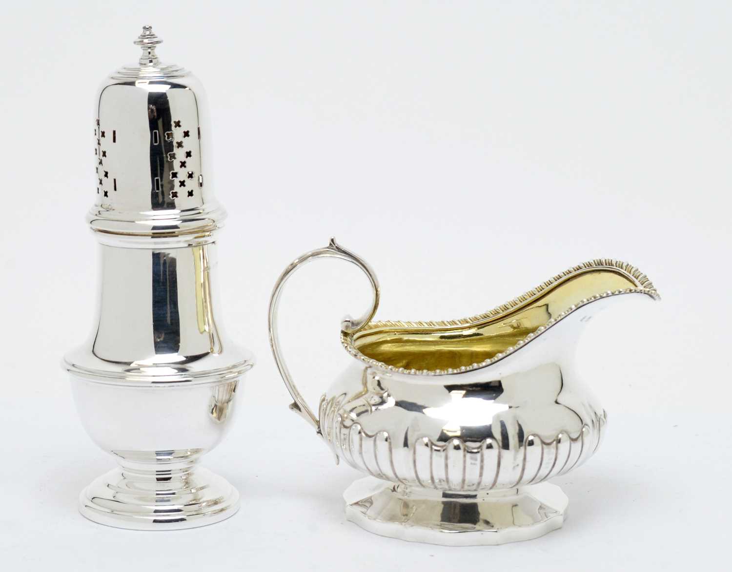 Lot 176 - A George IV silver jug and George V silver caster
