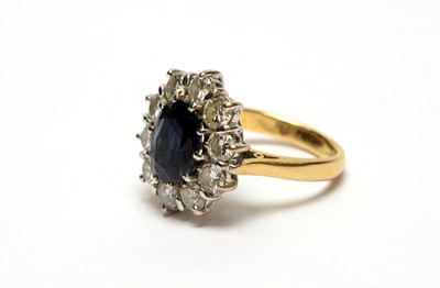 Lot 108 - A sapphire and diamond cluster ring
