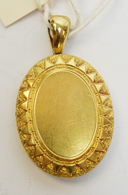 Lot 145 - A 19th Century Etruscan Revival yellow-metal locket.
