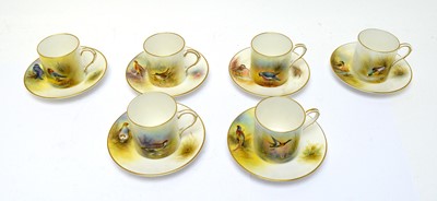 Lot 518 - Six Royal Worcester coffee cans and saucers with game birds by Peter Platt