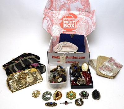 Lot 235A - A collection of vintage costume jewellery brooches and beaded evening bags.