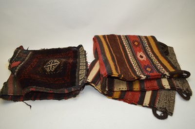 Lot 220 - A selection of Middle Eastern saddlebags and similar pillows