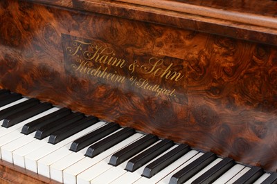 Lot 602 - Kaim & Sohn of Stuttgart - A burr walnut baby grand piano