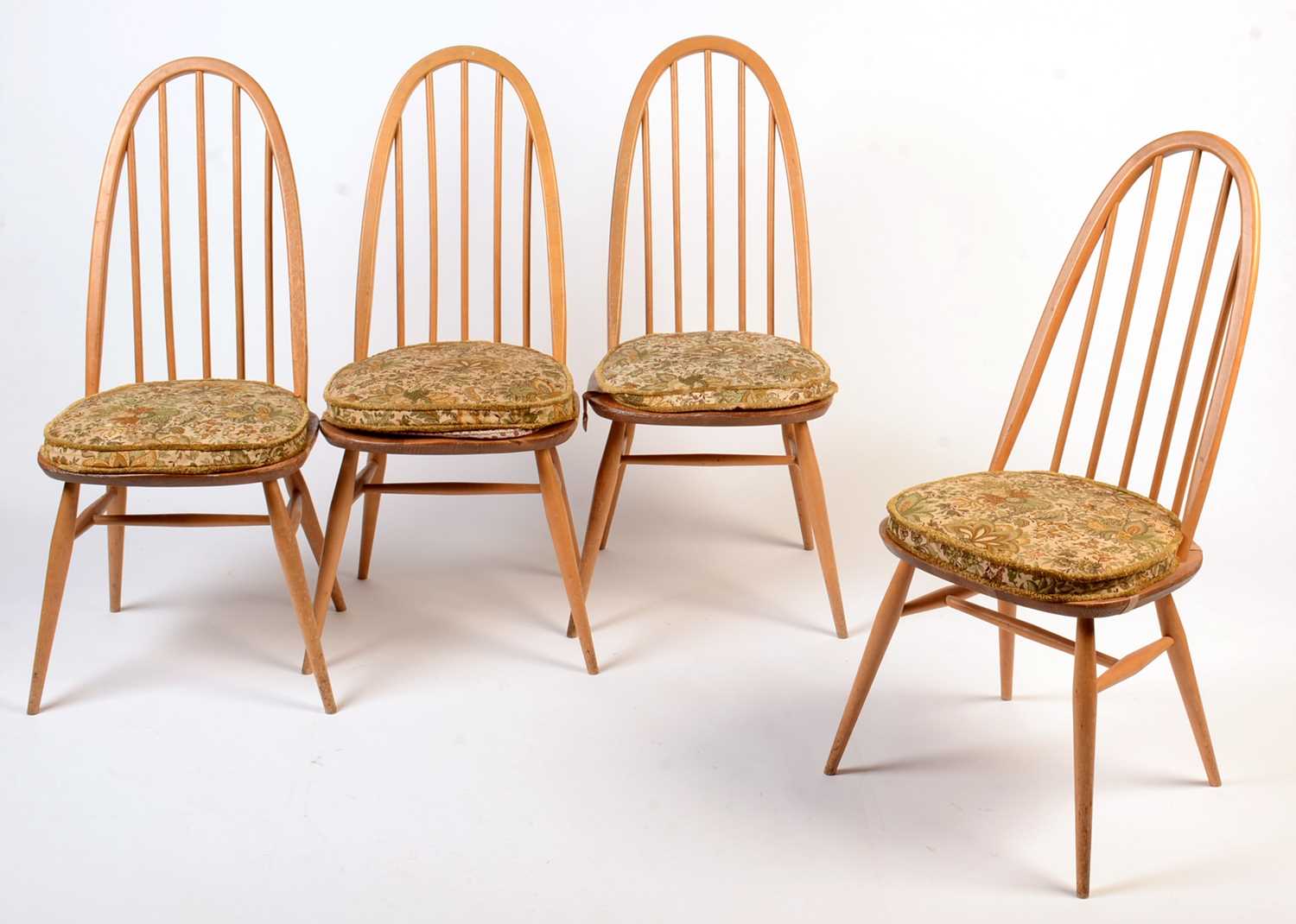 Lot 45 - Ercol: a set of four light beech and elm 'Quaker Windsor' chairs.