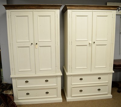 Lot 113 - A pair of Barker & Stonehouse two-door wardrobes.