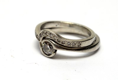 Lot 109 - Diamond engagement ring and wedding band