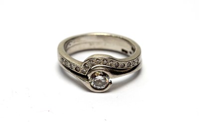 Lot 109 - Diamond engagement ring and wedding band