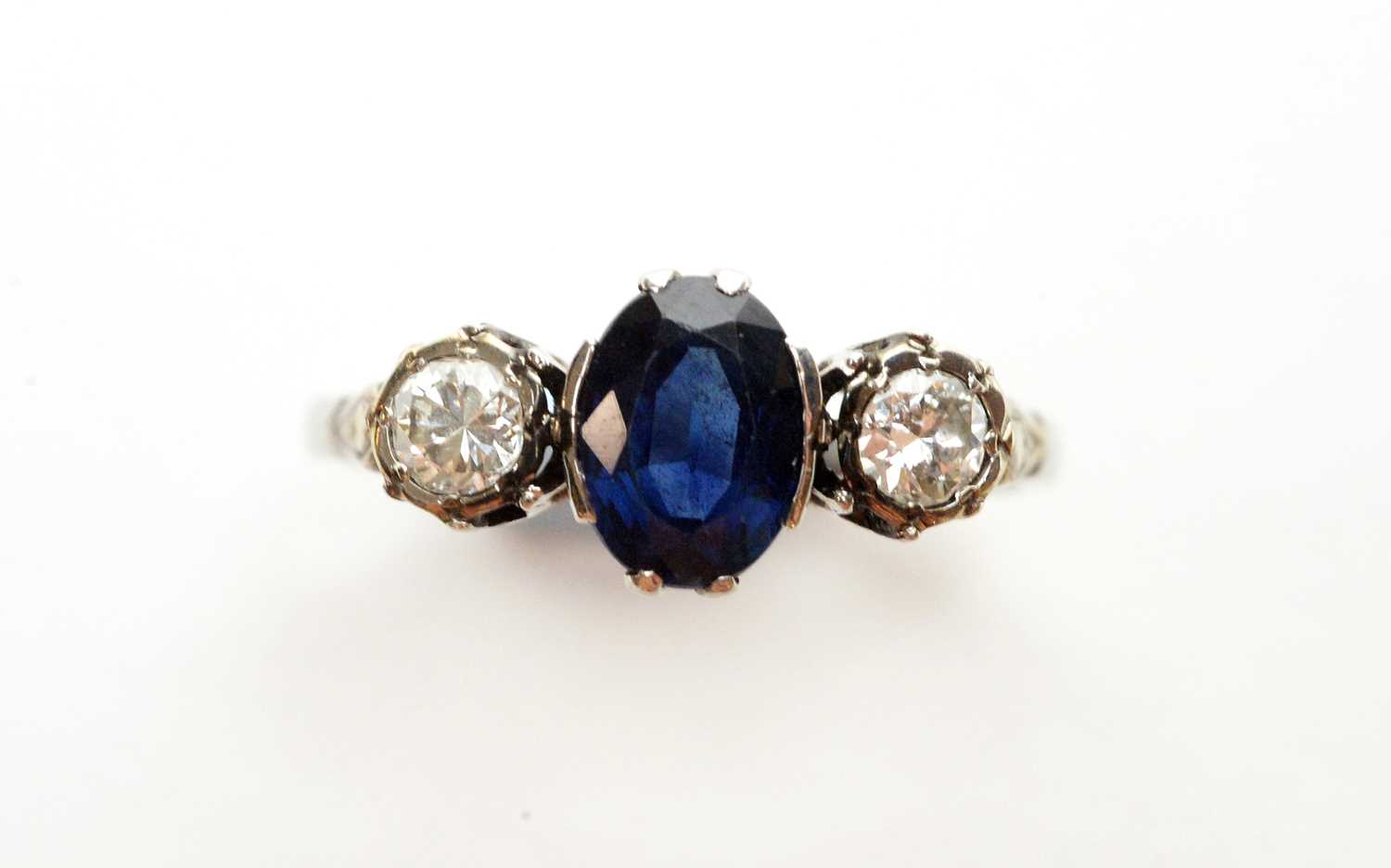 Lot 4 - A sapphire and diamond ring