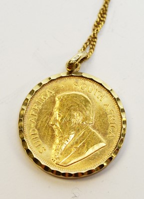 Lot 154 - A 1980 gold quarter Krugerrand held in a 9ct gold pendant mount.
