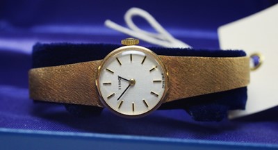 Lot 28 - Lady's 9ct gold Tissot wrist watch