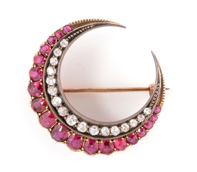 Lot 22 - A Victorian ruby and diamond crescent brooch