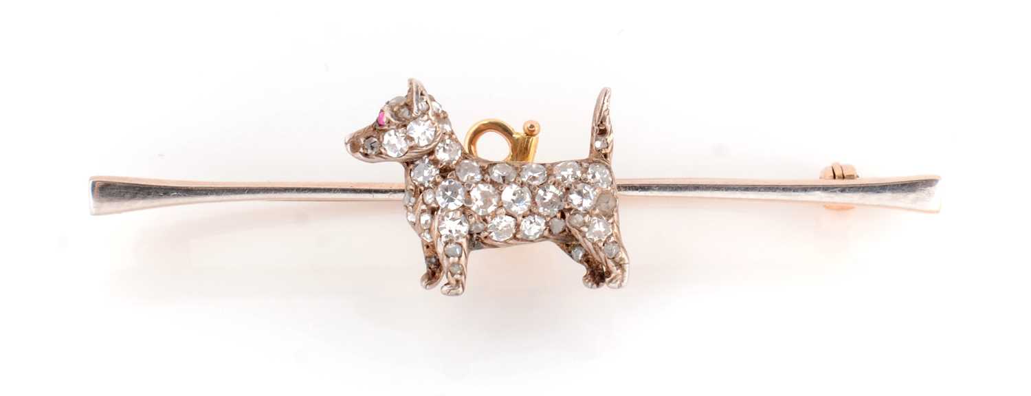 Lot 116 - A diamond set terrier pattern bar brooch