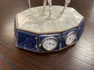 Lot 464 - A camel mounted lapis lazuli desktop clock